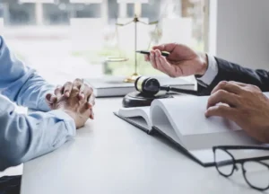 What Is Considered Domestic Assault in Texas? | Domestic Assault Lawyer Explains 3 domestic assault lawyer in fort bend county conducting a client consultation to discuss texas penal code and family violence defense strategies in sugar land.